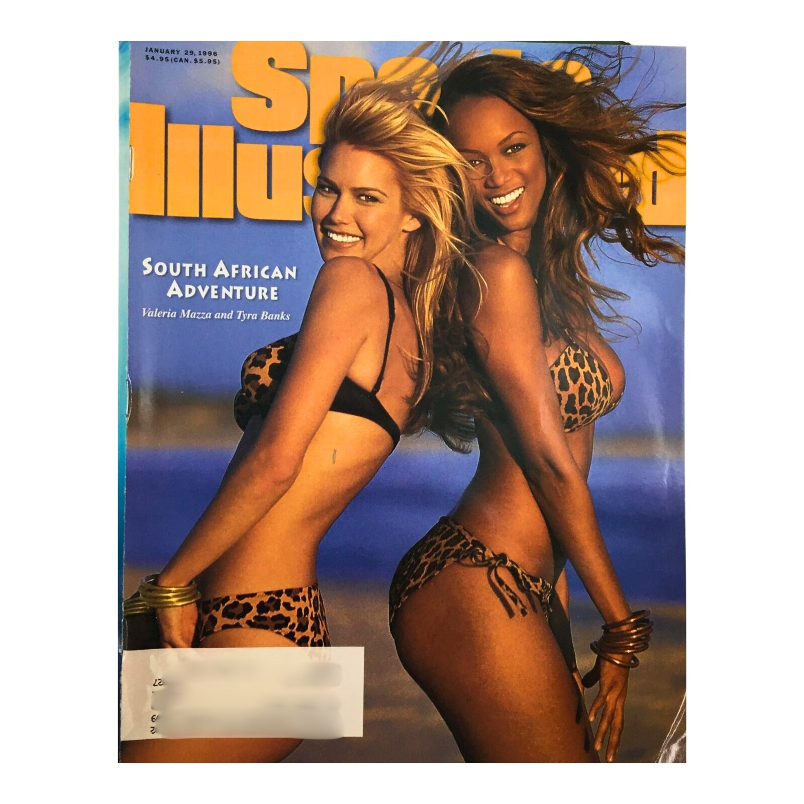 Cover of the Sports Illustrated Magazine Swimsuit Edition featuring Valeria Mazza and Tyra Banks in leopard print bikinis, titled 'South African Adventure.' This magazine is one of many from a collection celebrating the 1990s swimsuit issues.
