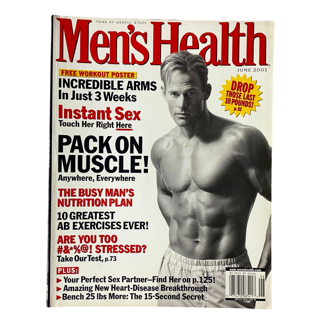 Cover of Men's Health Magazine June 2001 featuring the headline 'The Busy Man's Nutrition Plan' alongside a shirtless male model emphasizing fitness and muscle. This vintage magazine includes insights on nutrition and health for men, making it a valuable collectible item.