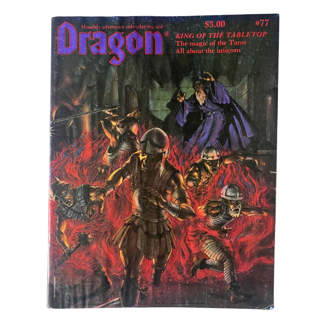 Cover of Dragon Magazine September 1983, Issue #77 titled 'King of the Tabletop' featuring a dramatic illustration with adventurers amidst flames, depicting themes related to tabletop gaming.