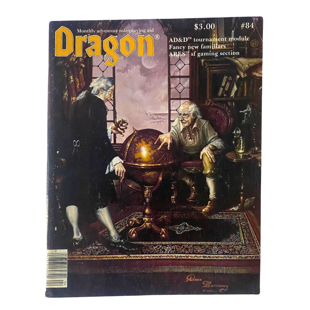 Cover of VTG Dragon Magazine April 1984, issue #84, featuring the ARES Section. The cover showcases fantasy artwork with two characters, one pointing at a globe in an enchanting setting.