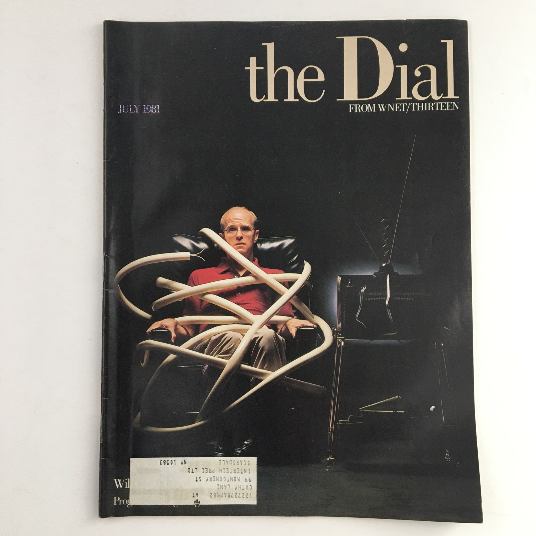 The Dial Magazine July 1981 cover featuring a man seated, wrapped in cables, representing the theme of the cable TV industry and public broadcasting.