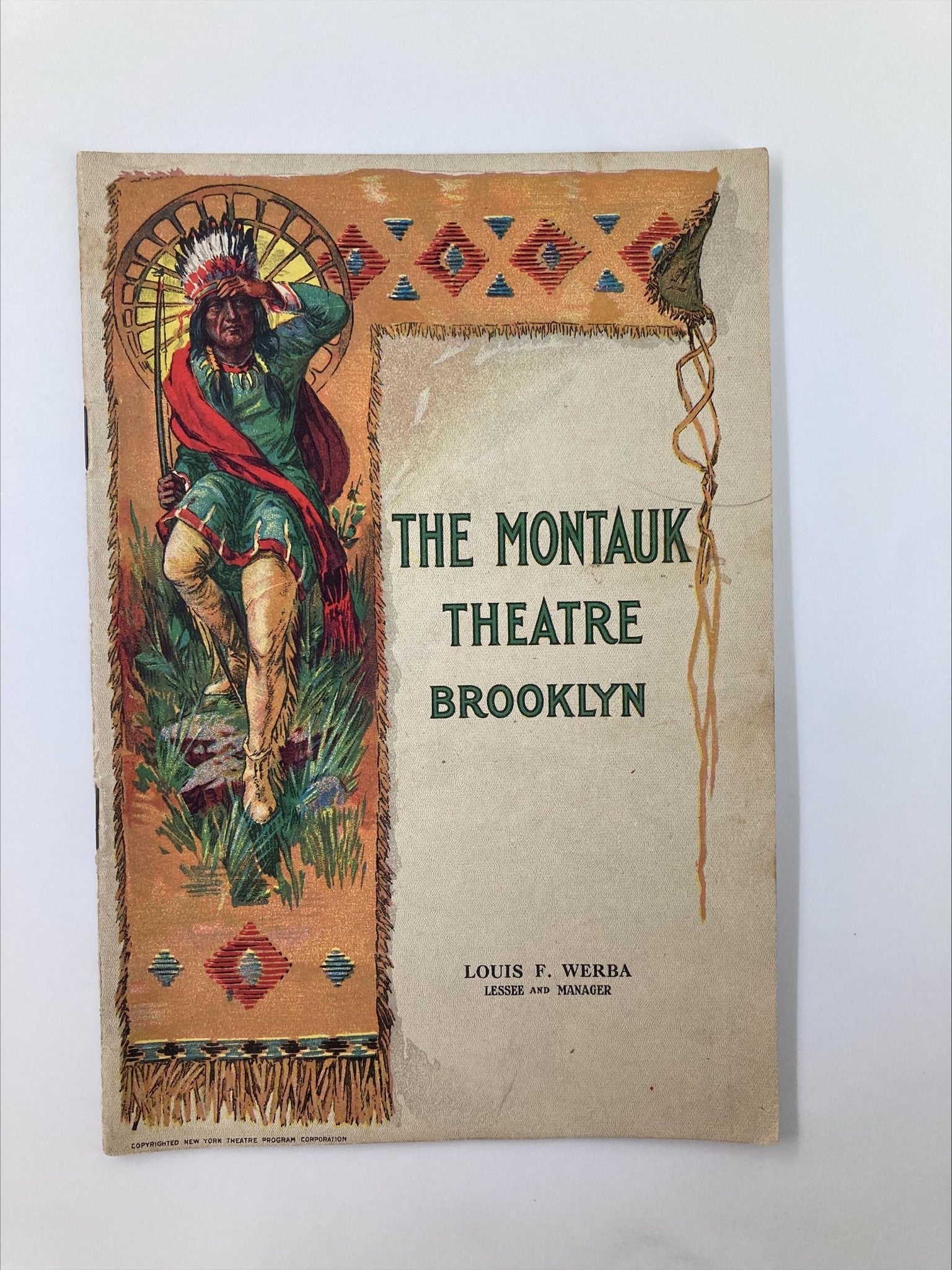 Cover of 1921 The Montauk Theatre Brooklyn Lightnin' by Winchell Smith & Frank Bacon, featuring a colorful illustration of an Indigenous man holding a sunburst, with ornate decorative patterns.