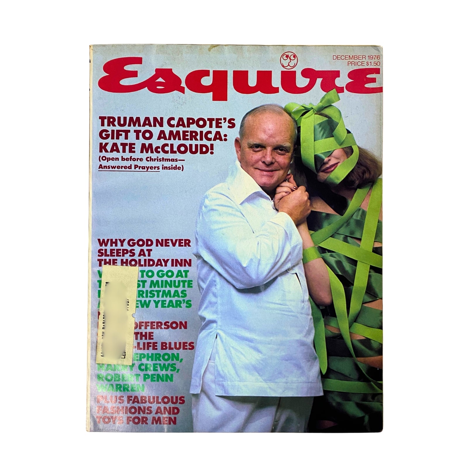 Esquire Magazine December 1976 cover featuring Truman Capote's Gift: Kate McCloud with a male model in white attire and a woman wrapped in green ribbons.