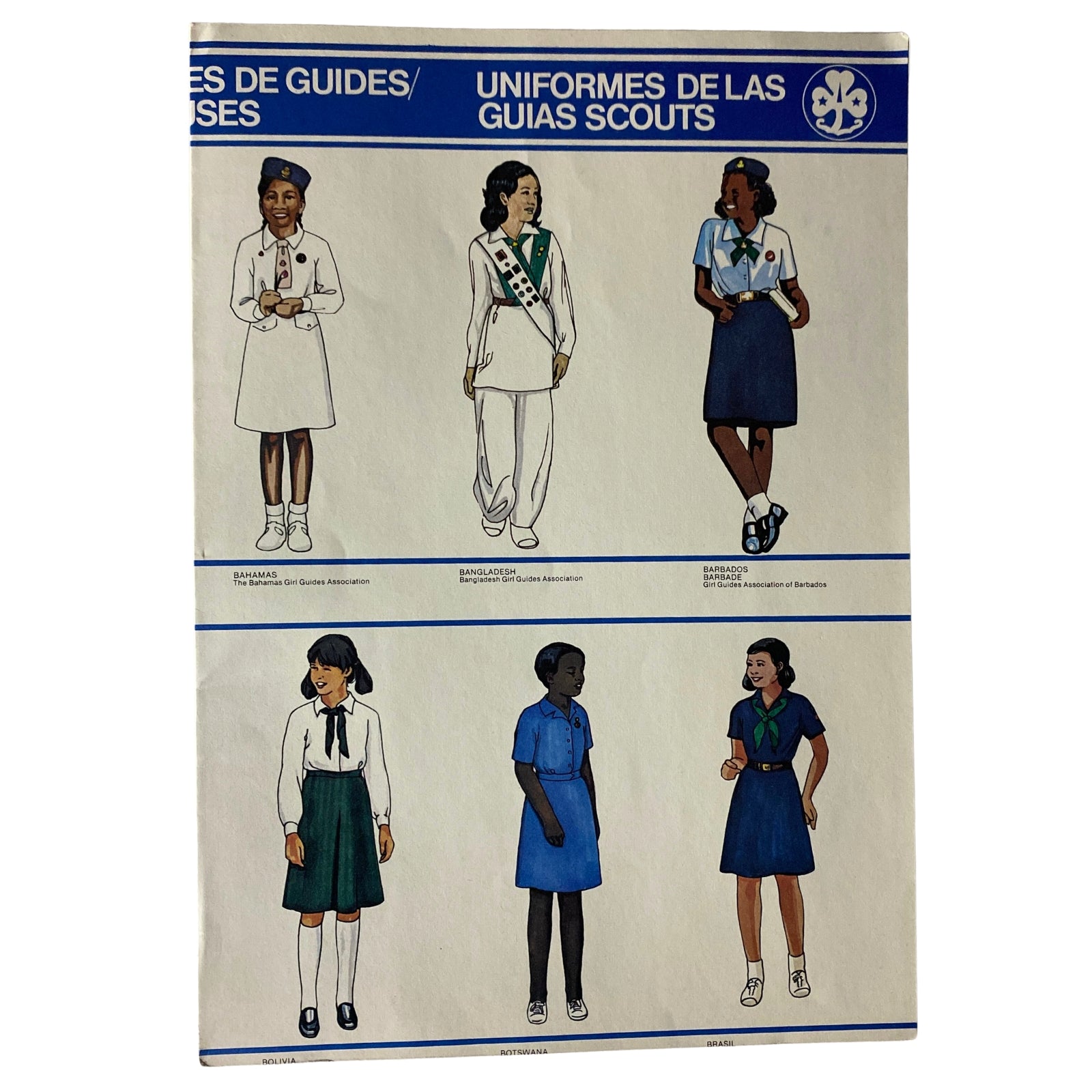 Illustrations from the 1980 Uniform of the Girl Scout and Brownie Scout Equipment Catalog #1 showcasing various official uniforms for scouts, featuring designs for different countries including the Bahamas and Bangladesh.