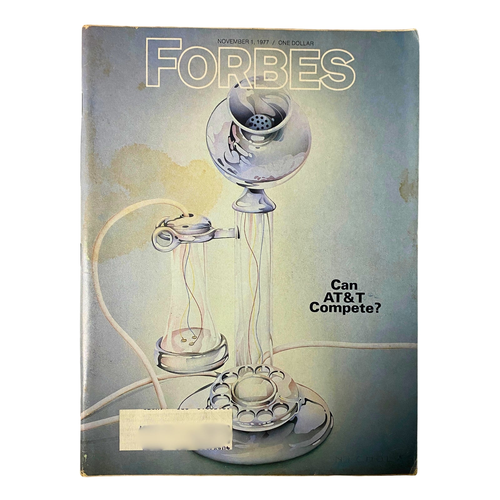 Forbes Magazine November 1, 1977 cover featuring a vintage telephone and the text 'Can AT&T Compete?' highlighting the cover story about AT&T's transformation in the telecommunications market.