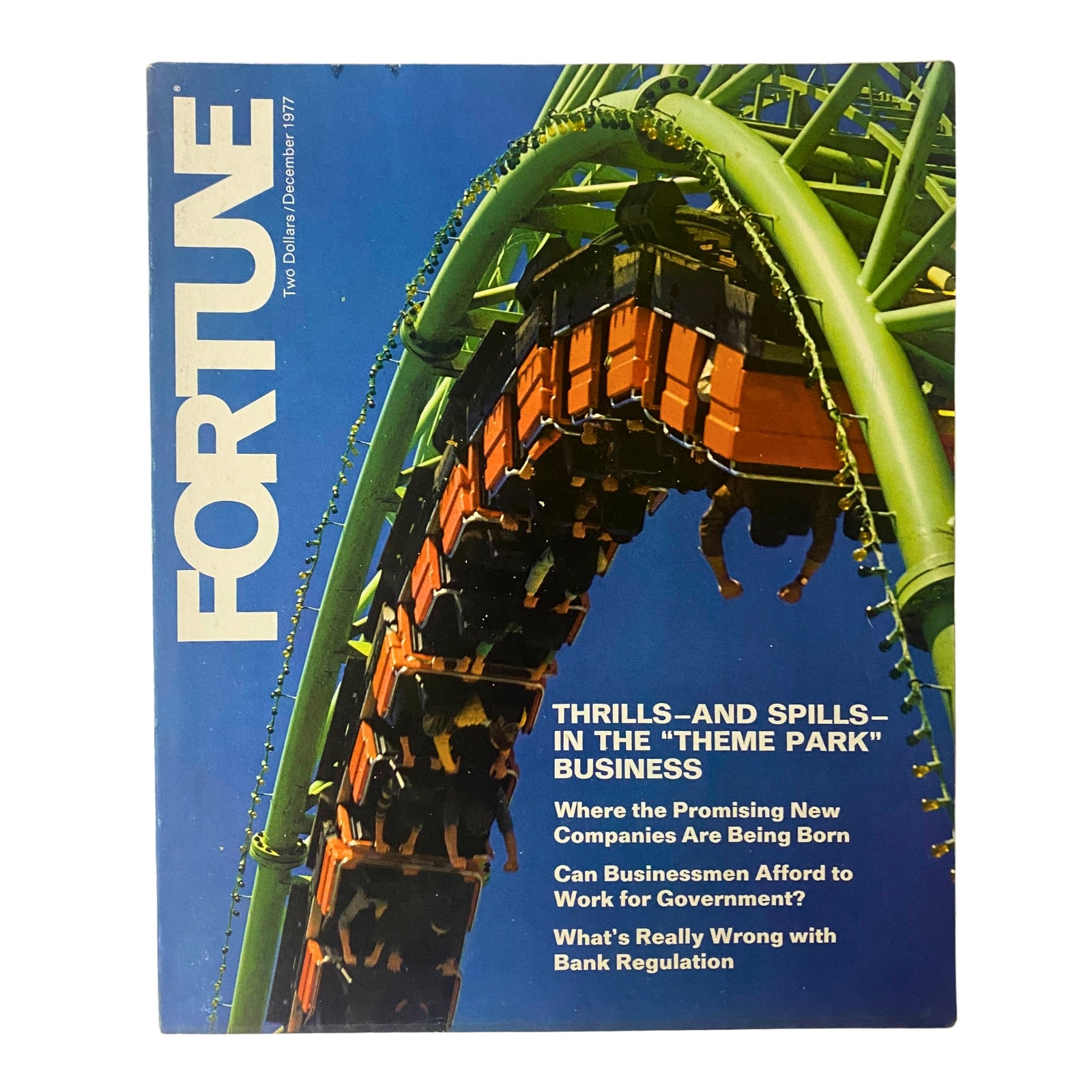 Cover of Fortune Magazine December 1977 featuring the theme 'Thrills & Spills: The Theme Park Business' with a vibrant image of a roller coaster.
