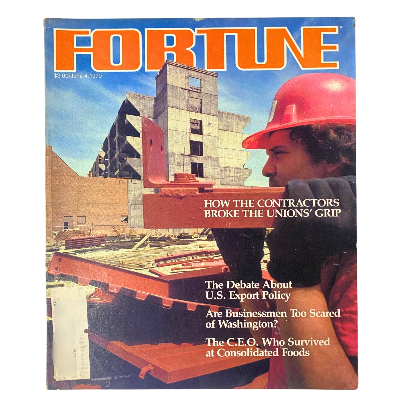 Cover of Fortune Magazine June 4, 1979 featuring the title 'How The Contractors Broke The Unions' Grip' with an image of a construction worker wearing a hard hat on a construction site, amidst buildings under construction.