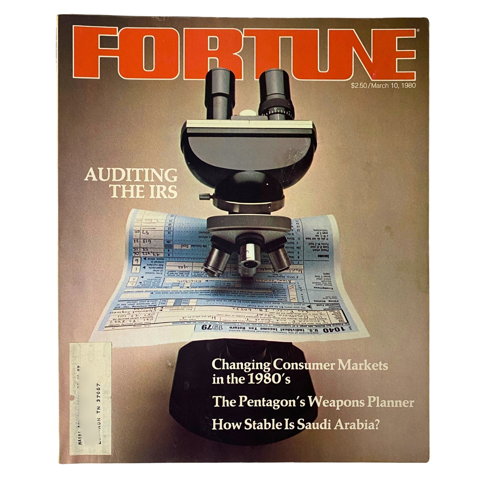 Cover of Fortune Magazine March 10, 1980 featuring a microscope on auditing IRS documents, highlighting articles about tax policy and economics.