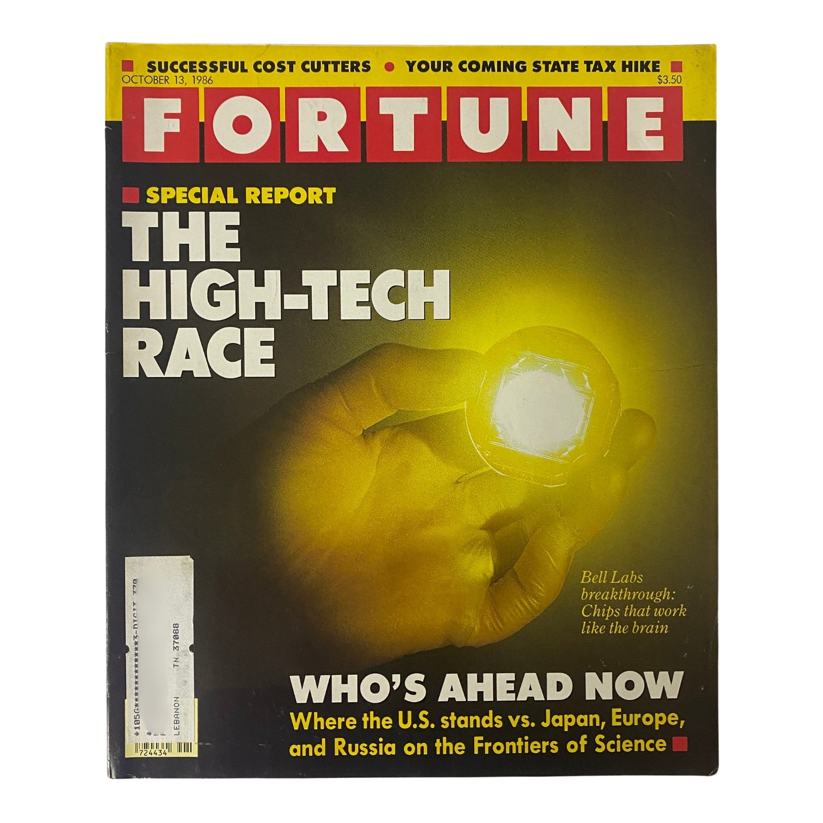 Cover of Fortune Magazine October 13, 1986 featuring the title 'The High-Tech Race', highlighting advancements from Bell Labs. The cover illustrates a hand holding a luminescent object with the text 'Who's Ahead Now?'. A vintage collectible reflecting the technological landscape of the 1980s.