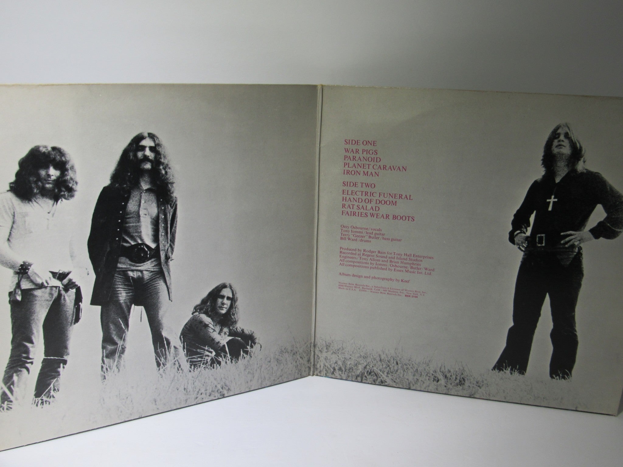 Inside gatefold of Black Sabbath Paranoid Warner Bros. Records LP BSK 3104, displaying band members and album track listing.