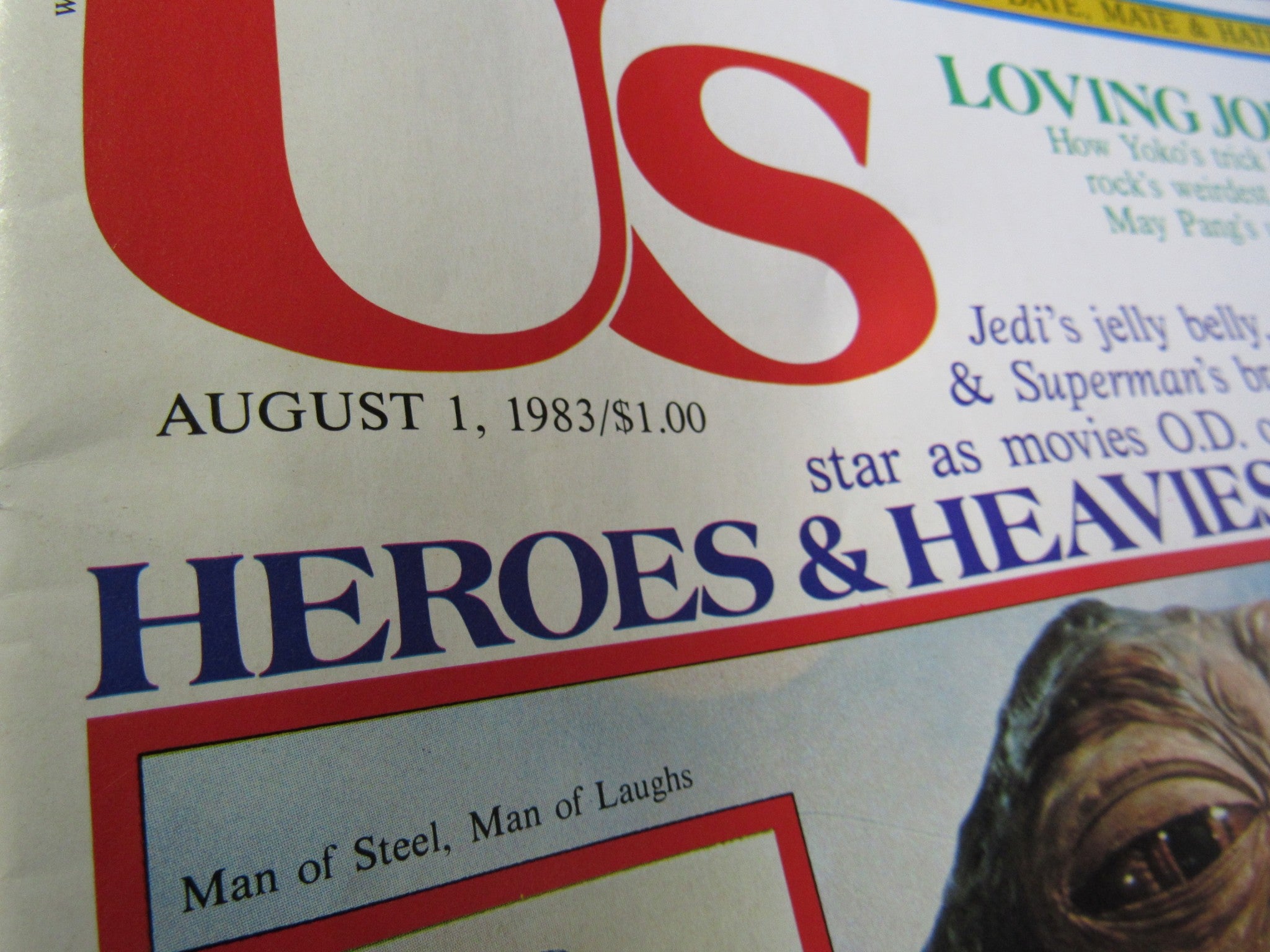 Close-up of the title and details on the cover of Vintage US Magazine August 1, 1983, showcasing 'Heroes & Heavies' and other featured stories.