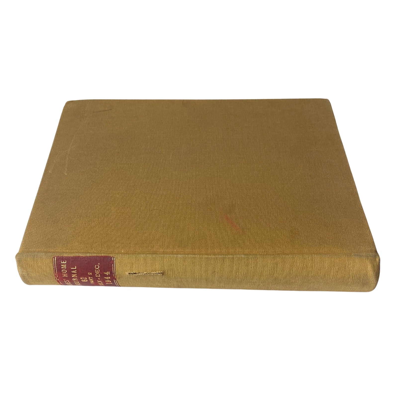 Ladies' Home Journal Library Bound Magazine 1944 July - December, highlighting the top view of the magazine's bound edges with minor imperfections visible.