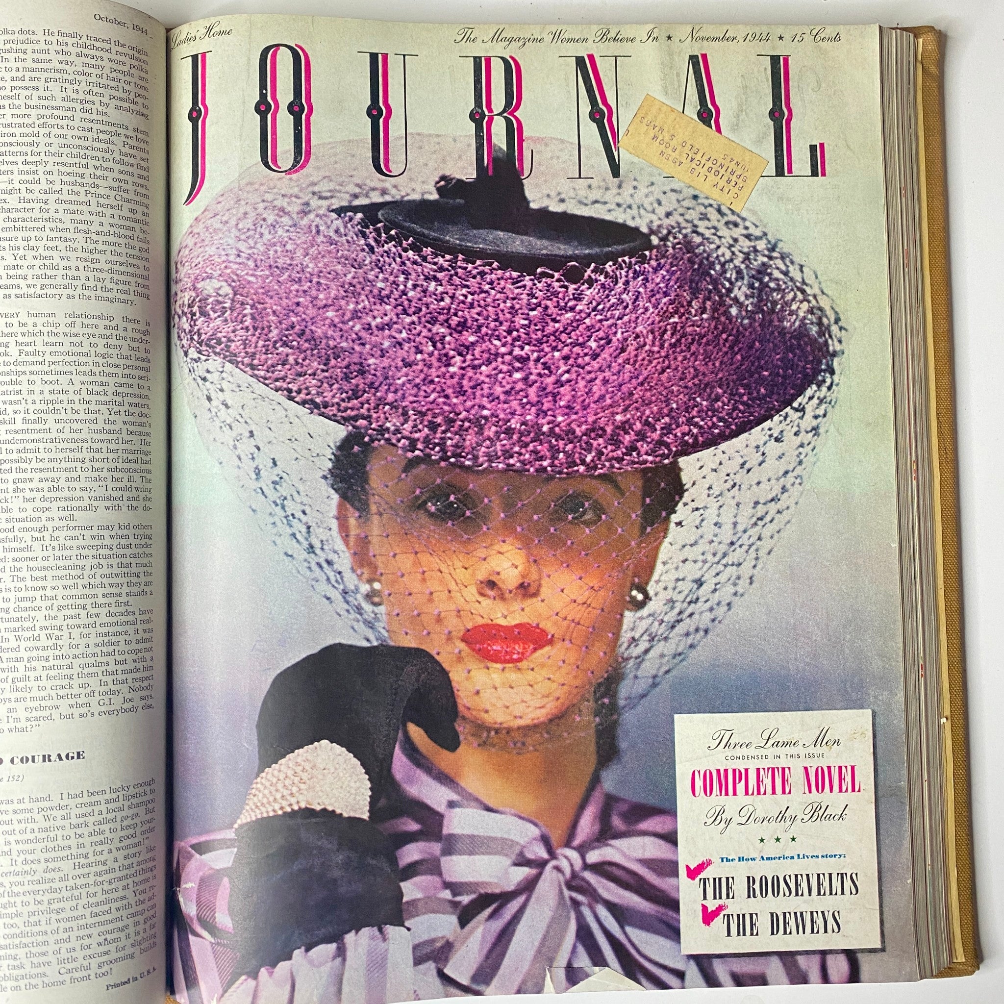Cover of the Ladies' Home Journal from November 1944 showcasing a woman in a stylish purple hat and gloves, representing 1940s fashion and elegance.