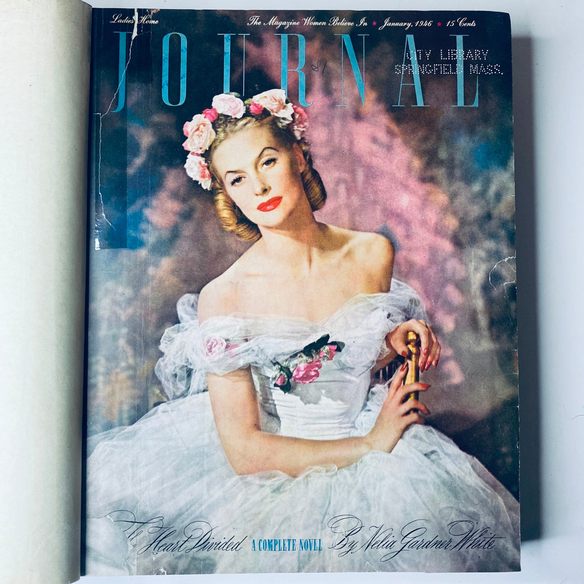 Cover of Ladies' Home Journal January 1946 featuring a glamorous woman in a white gown, illustrating the vintage aesthetic of the publication.