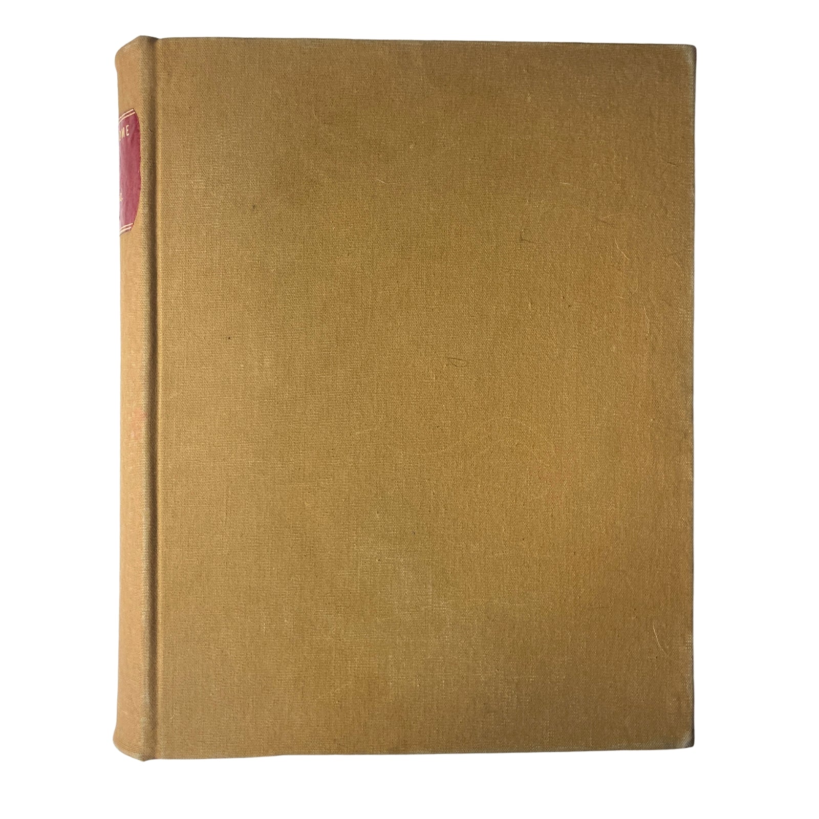 Side view of the Ladies' Home Journal Bound Magazine 1946, highlighting the gold fabric cover and spine.