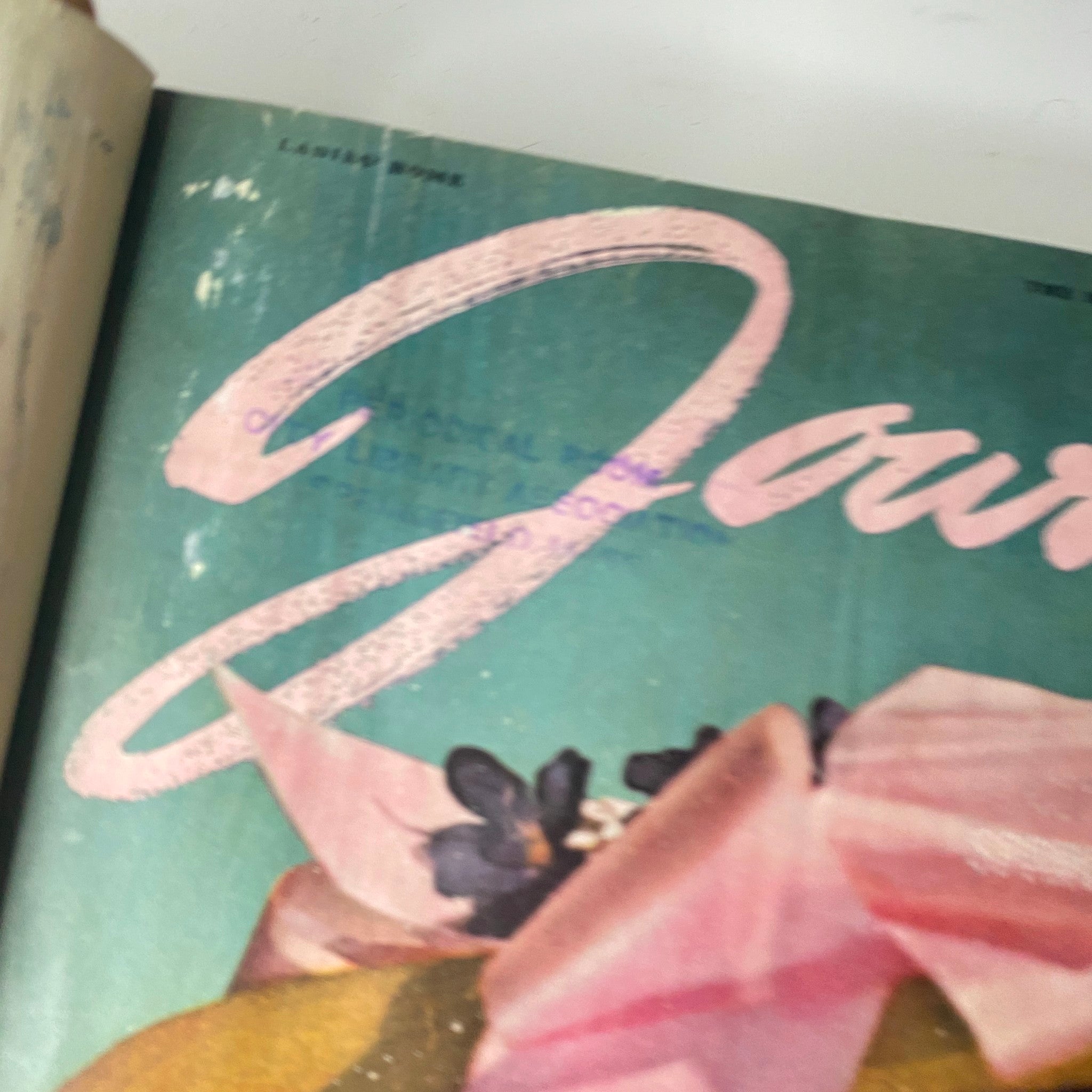 Close-up of the Ladies' Home Journal title on a vintage magazine cover, highlighting the elegant font and design elements from 1946.