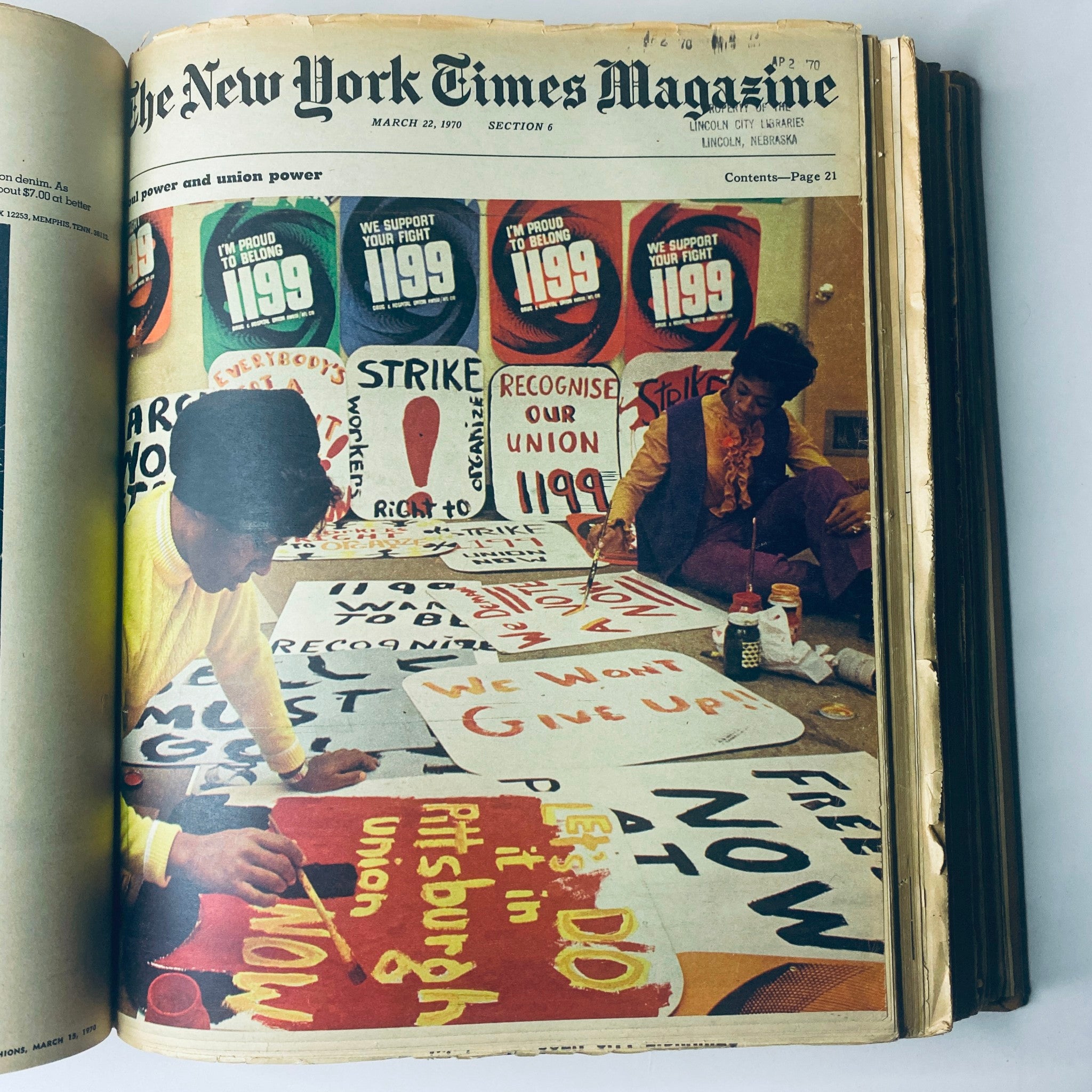 The New York Times Library Edition Bound Magazine highlights individuals creating union protest signs, captured in the March 22, 1970 issue. This image reflects the socio-political climate and labor movements of the time.