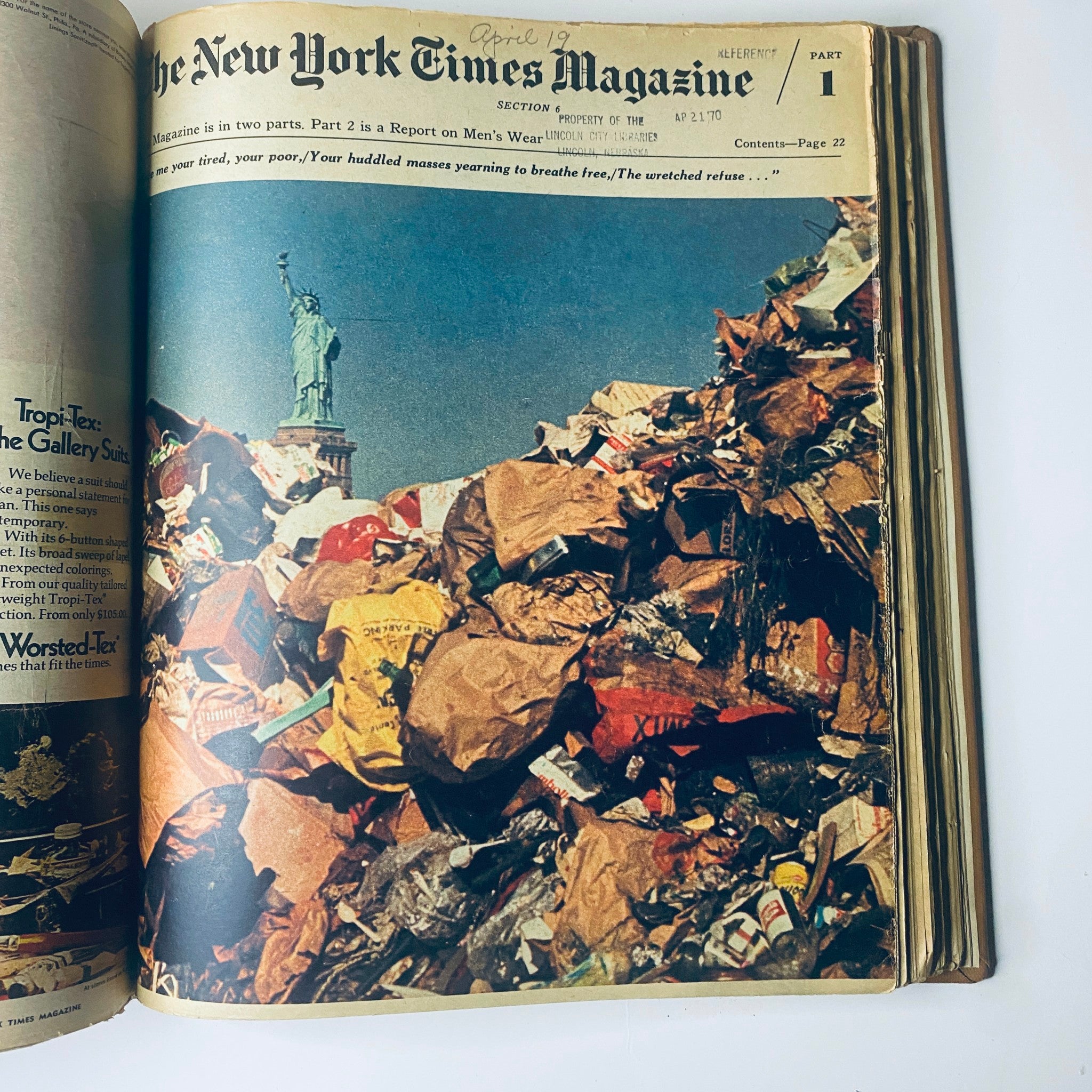 The New York Times Library Edition Bound Magazine - April 19, 1970. Cover features a striking image of garbage stacked high with the Statue of Liberty in the background, addressing issues of urban decay.