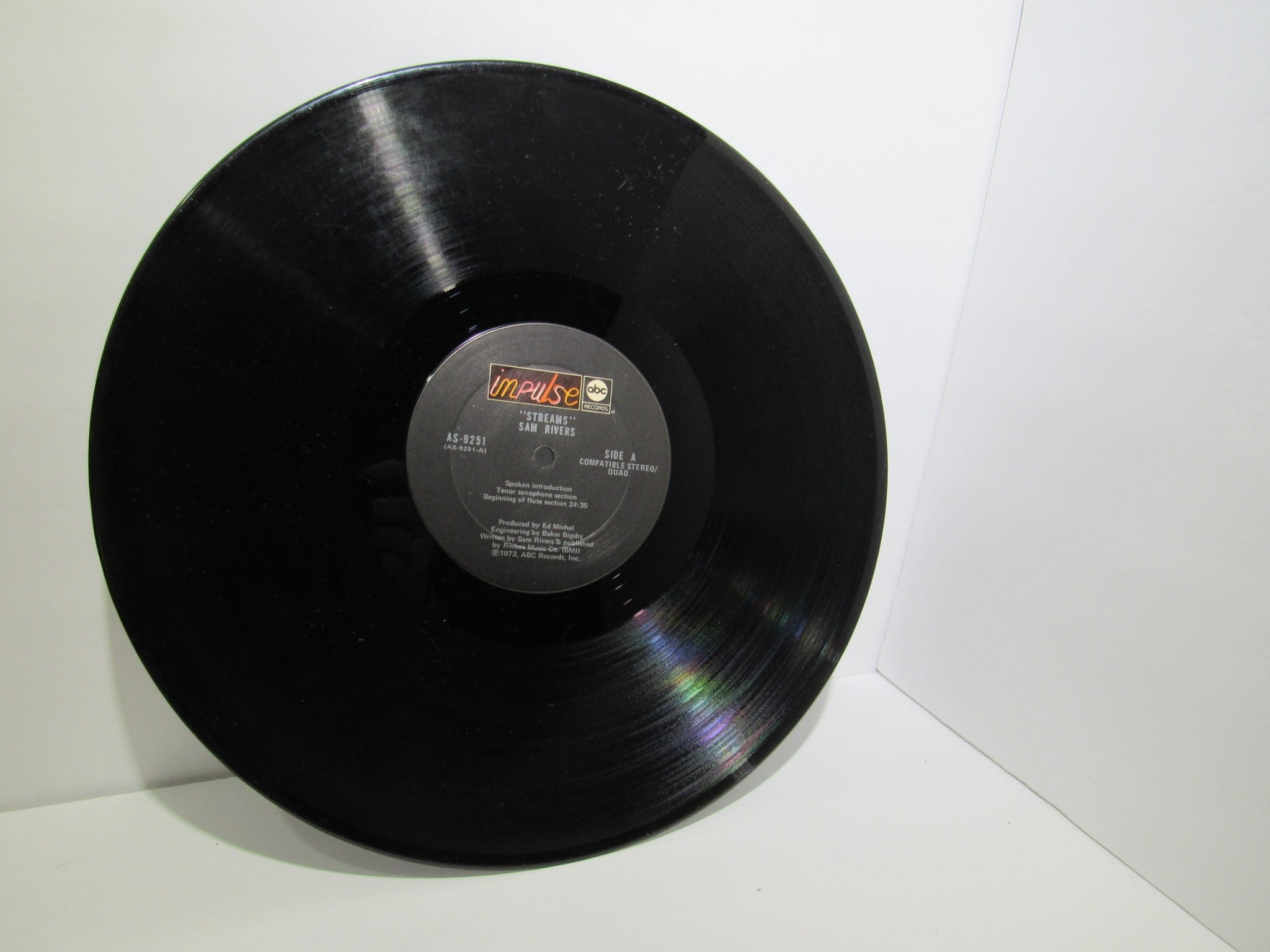 Close-up view of Sam Rivers: Streams Impulse! AS-9251 vinyl record label, emphasizing its condition for collectors, grade VG.