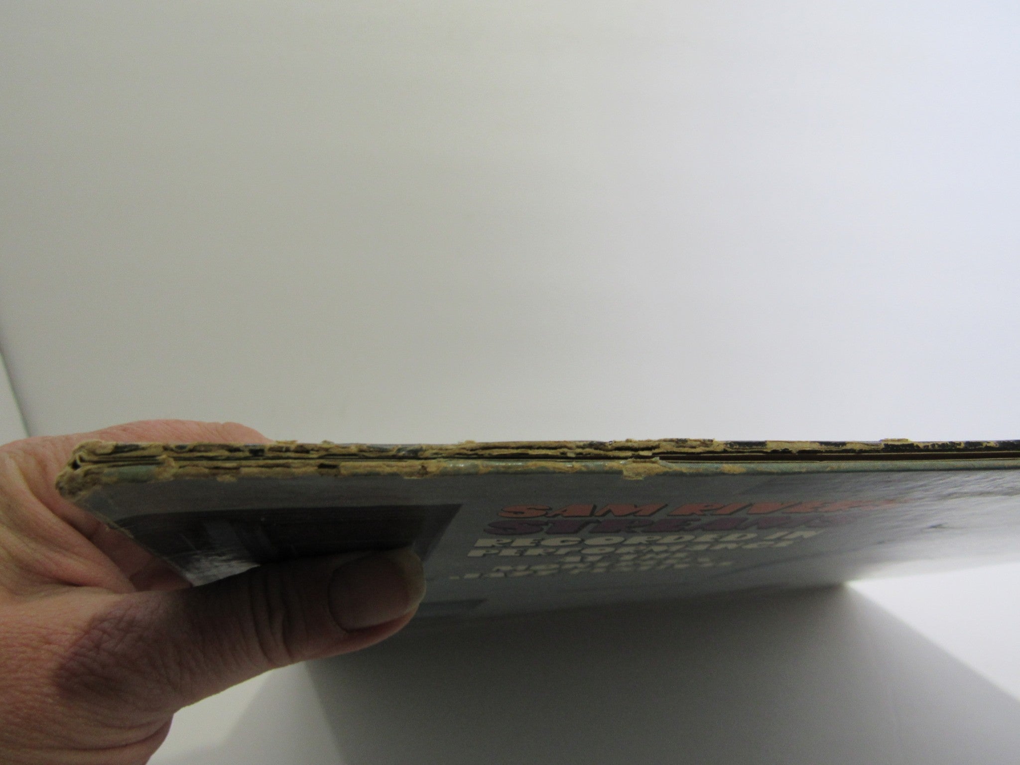 Image showing the edge of the cover for Sam Rivers: Streams Impulse! AS-9251, indicating some wear and aging of the album cover.