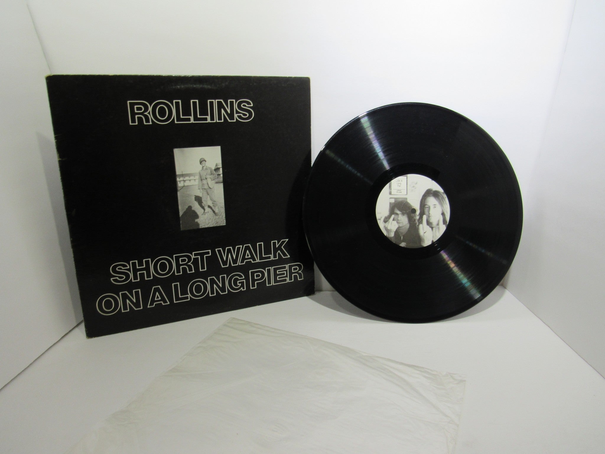 Rollins: Short Walk On A Long Pier Lone Wolf Records LWR007 LP Grade: VG