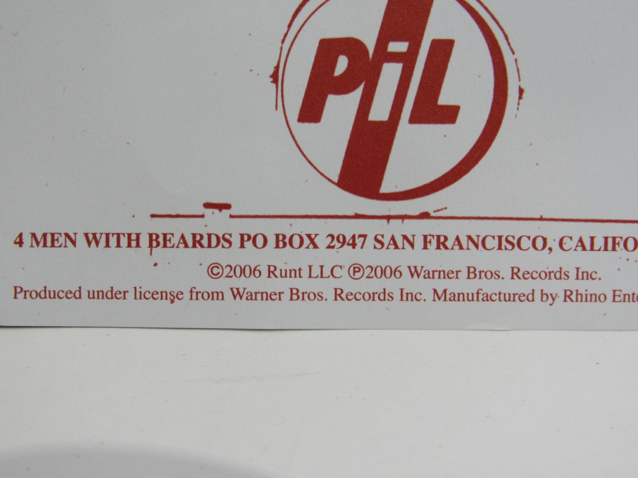 Close-up of the back cover featuring Public Image Limited Metal Box 4 Men With Beards – 4M 500, showing record details and copyright information.