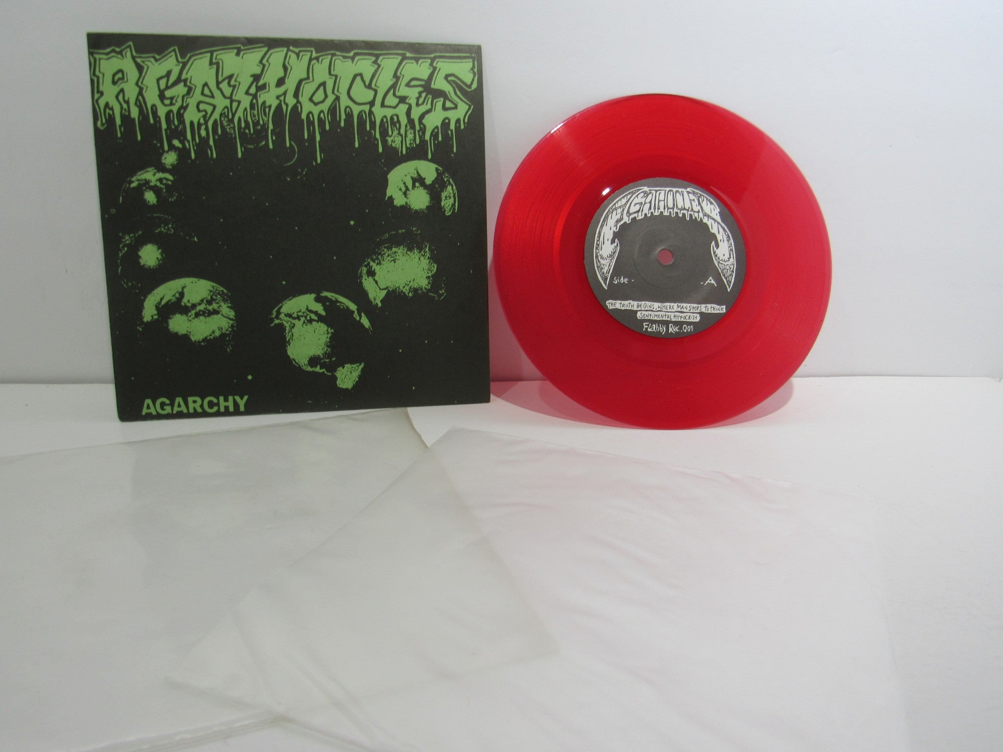 Agathocles: Agarchy Flabby Malarie Records 001 Red RI 7" EP Grade: VG+