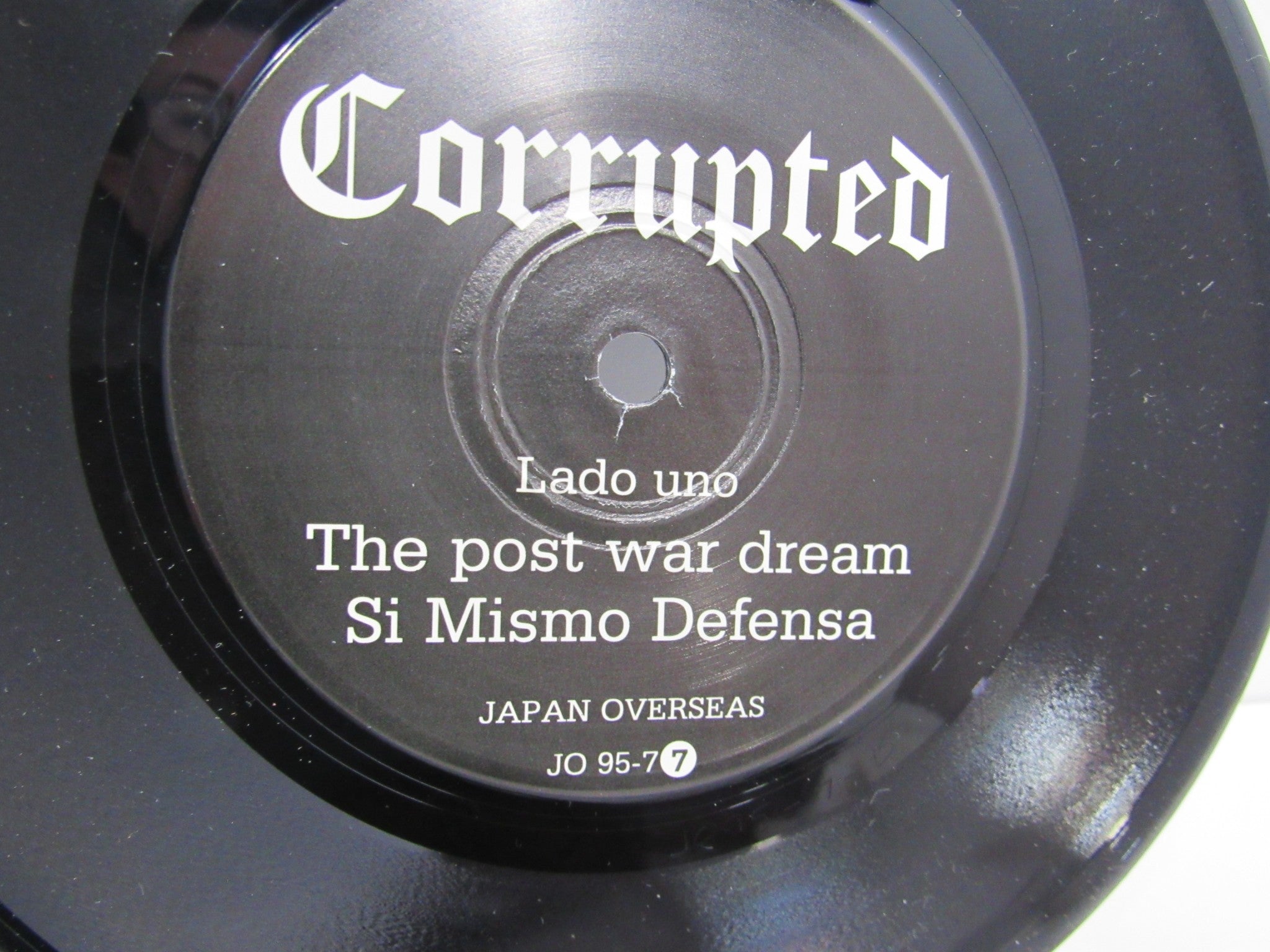 Corrupted: Anciano Japan Overseas JO95-77 7" EP Grade: VG+