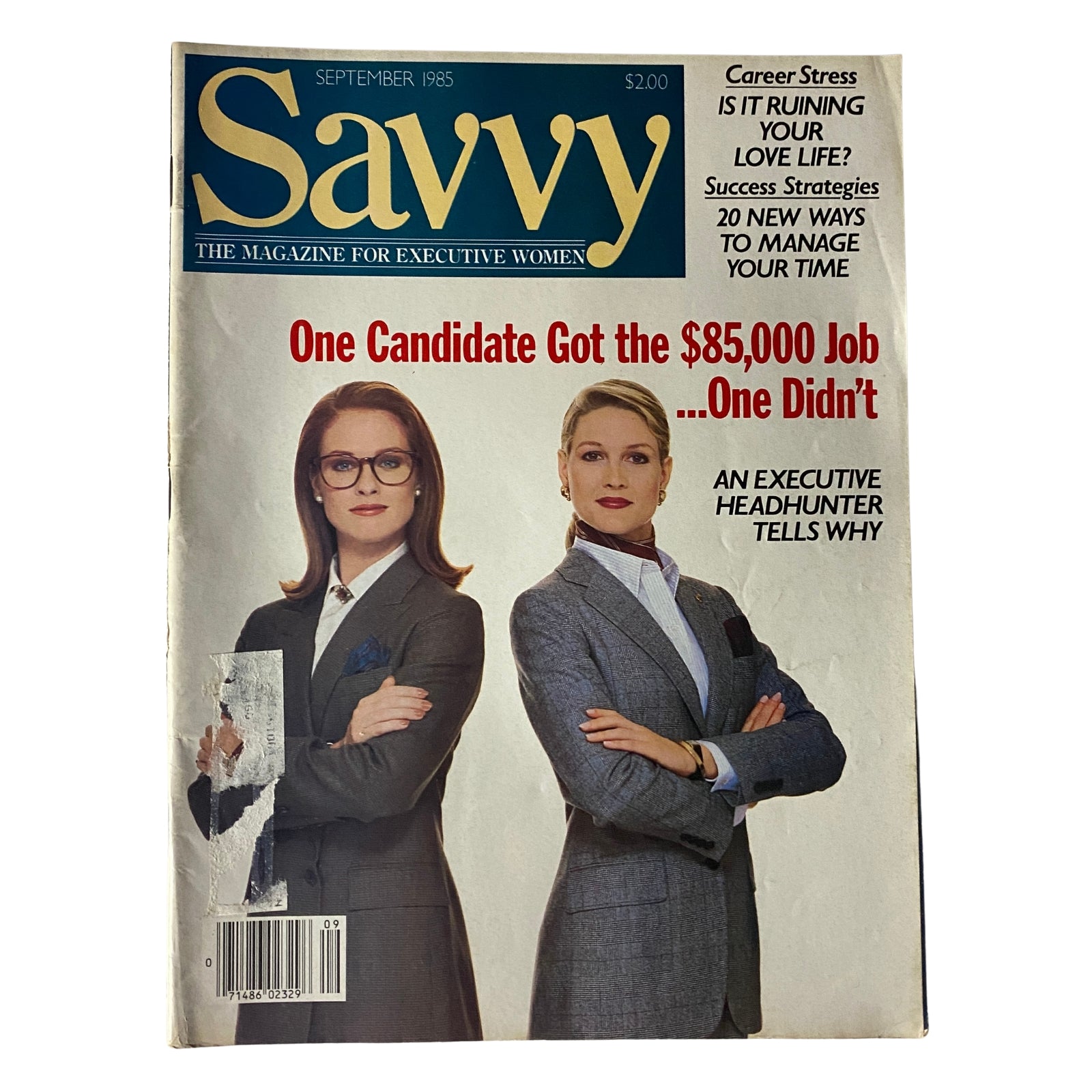 Savvy Magazine September 1985 cover featuring two professional women in suits. The text highlights career strategies and an executive headhunter's insights, promoting the magazine's focus on women's career advancement.
