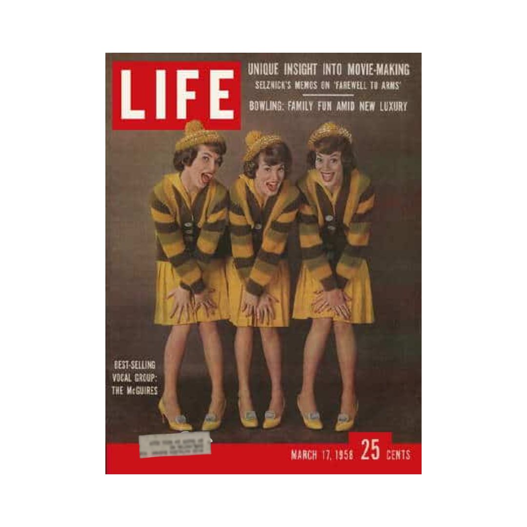 Cover of VTG Life Magazine March 17, 1958 featuring the McGuire Sisters, a best-selling vocal group, in vibrant yellow dresses. The magazine showcases cultural insights and noteworthy articles from the late 1950s.