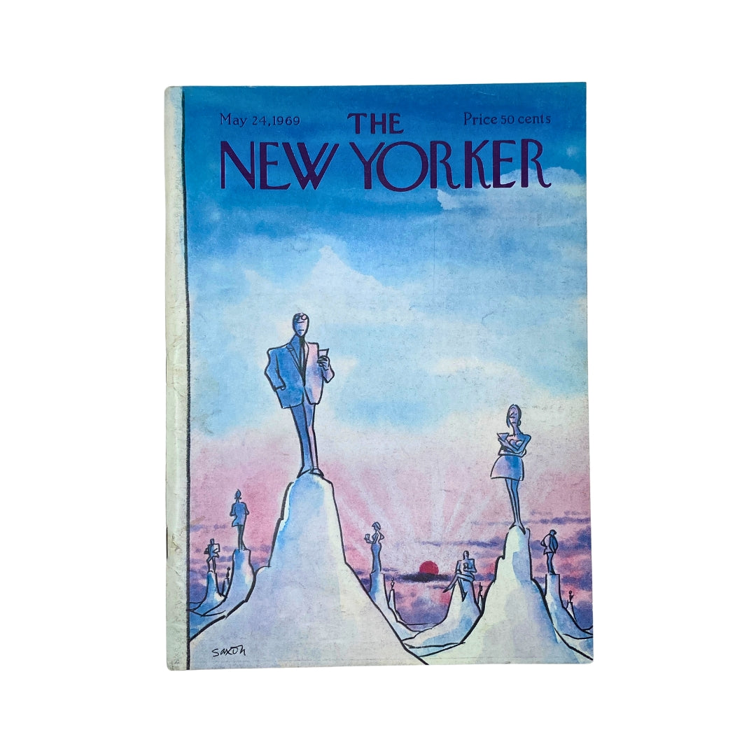 The New Yorker Complete Magazine May 24, 1969 with Charles Saxon Cover, featuring illustrations of stylized figures on mountains against a colorful sunset backdrop.