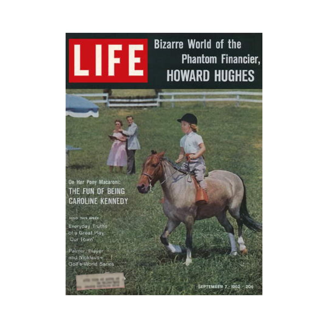 VTG Life Magazine cover from September 7, 1962 featuring Caroline Kennedy on her pony Macaroni, with a vibrant countryside scene and additional figures in the background, emphasizing the charm of early 1960s America.