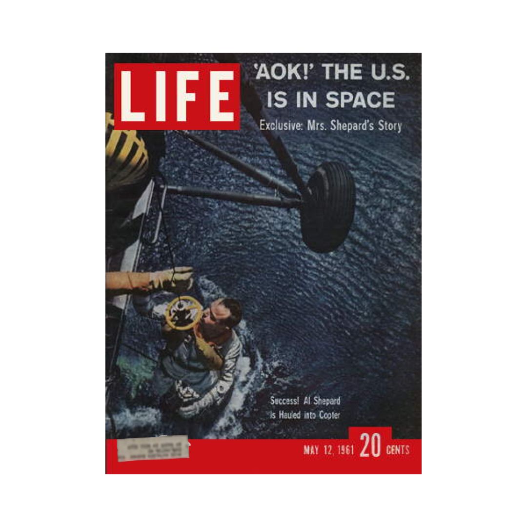 Cover of the May 12, 1961 issue of Life Magazine featuring Astronaut Alan Shepard, showcasing his return from space with the headline 'AOK! The U.S. is in Space'. This historical magazine includes stunning photography and articles reflective of the 1960s space exploration era.