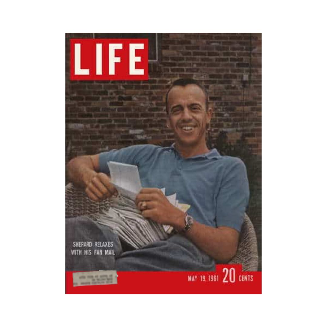 Vintage Life Magazine May 19, 1961 featuring astronaut Alan Shepard relaxing while reading fan mail, showcasing the cultural significance of space exploration during the 1960s.