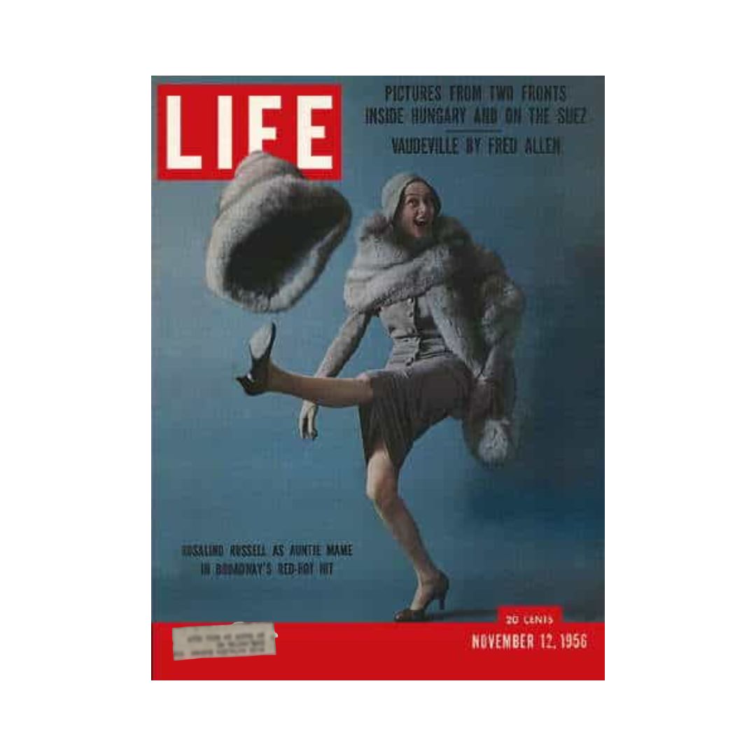 Cover of Life Magazine from November 12, 1956, featuring Rosalind Russell as Auntie Mame, showcasing vintage fashion and cultural significance.