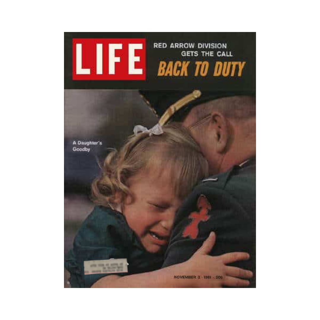 Cover of VTG Life Magazine November 3, 1961 featuring the Red Arrow Division with the headline 'Back to Duty'. The image shows a soldier embracing a crying young girl, symbolizing the emotional farewells related to military service in Vietnam.