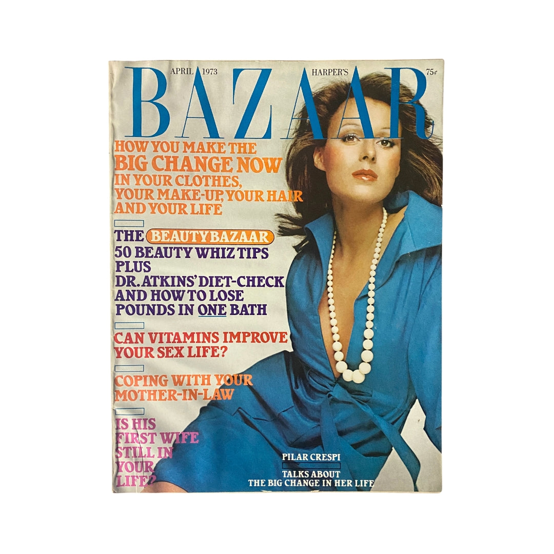Cover of Harper's Bazaar Magazine April 1973 featuring model Pilar Crespi, showcasing bold fashion and vibrant headlines.