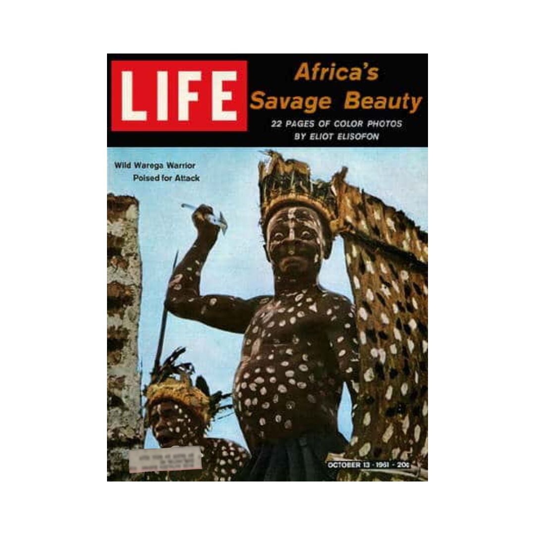 Cover of Life Magazine from October 13, 1961 featuring the title 'Wild Warega Warrior Poised for Attack in Africa'. The cover showcases a striking image of a warrior adorned with traditional body paint and a headdress, reflecting the cultural heritage of Africa.