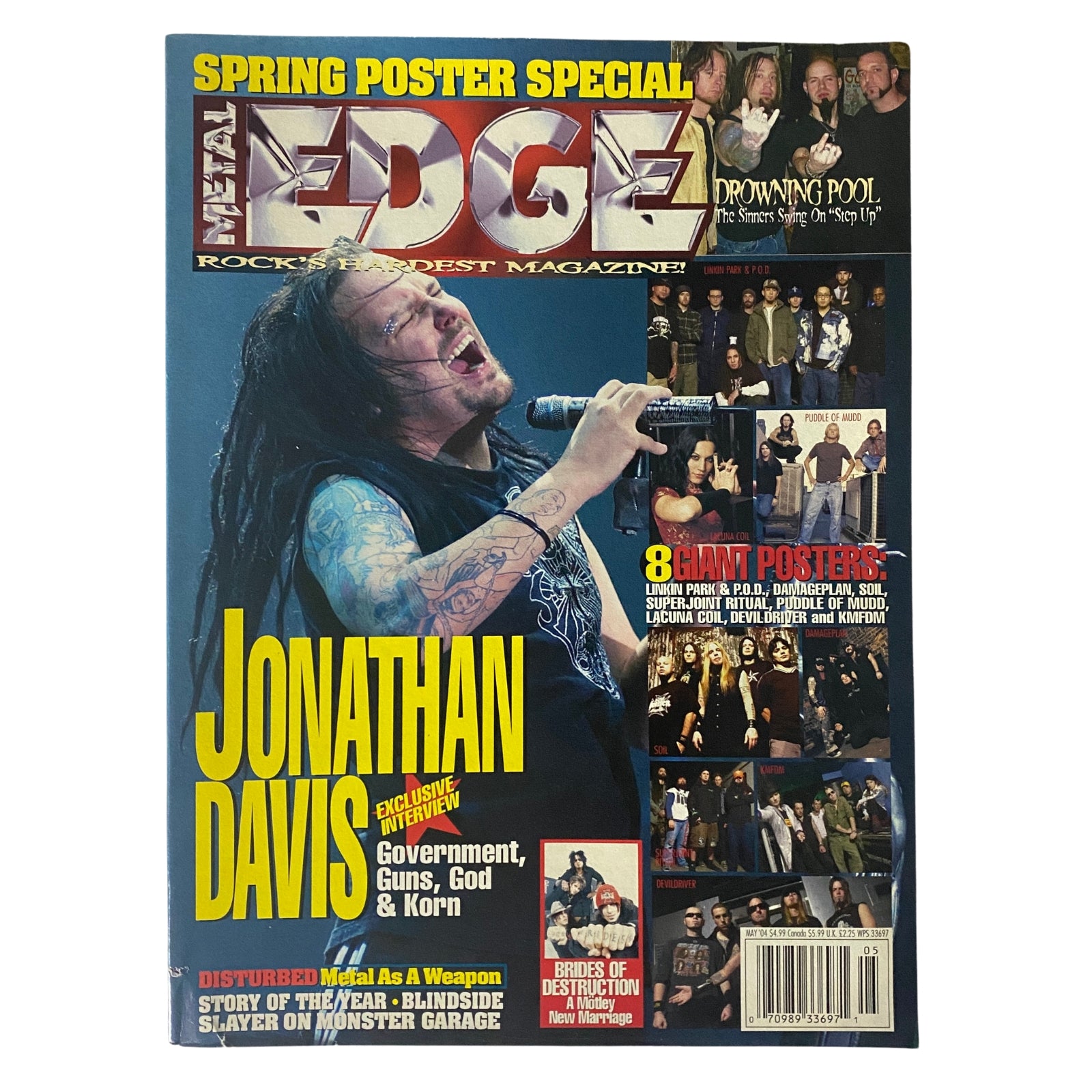 Metal Edge Magazine May 2004 featuring Jonathan Davis on the cover with an exclusive interview about Government, Guns, God, and Korn. The issue includes posters of iconic bands such as Linkin Park and Drowning Pool.