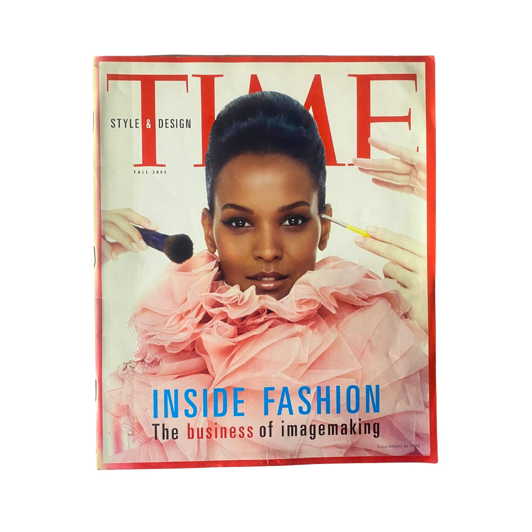Time Magazine Fall 2003 Style & Design issue featuring supermodel Liya Kebede on the cover, showcasing fashion with a vibrant pink ruffled outfit and makeup application, highlighting the theme 'Inside Fashion: The business of imagemaking'.