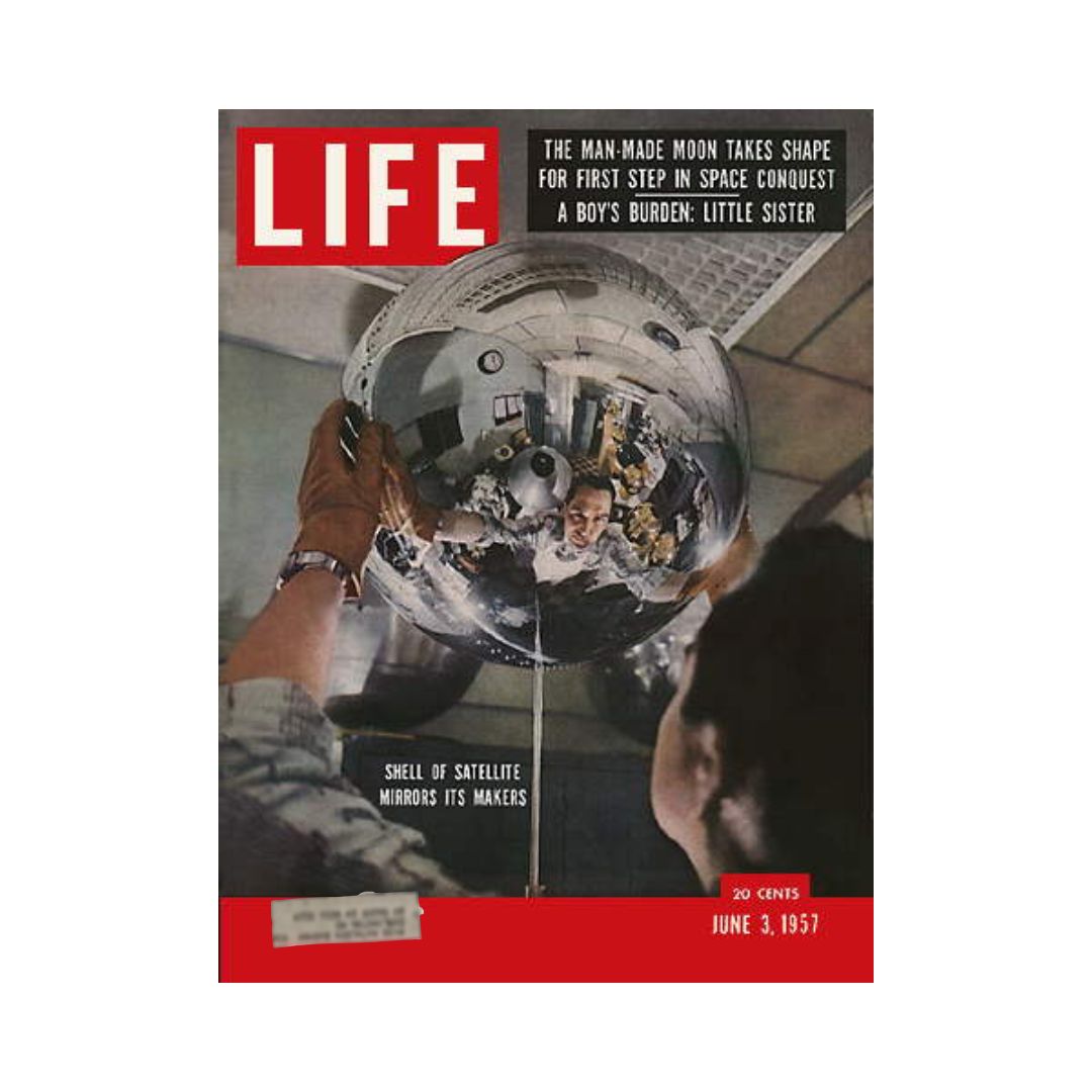Cover of VTG Life Magazine from June 3, 1957, featuring the theme 'Space Satellite' with an image capturing engineers working on a model of a satellite as they reflect on its surface. Highlights include 'The man-made moon takes shape for first step in space conquest'.