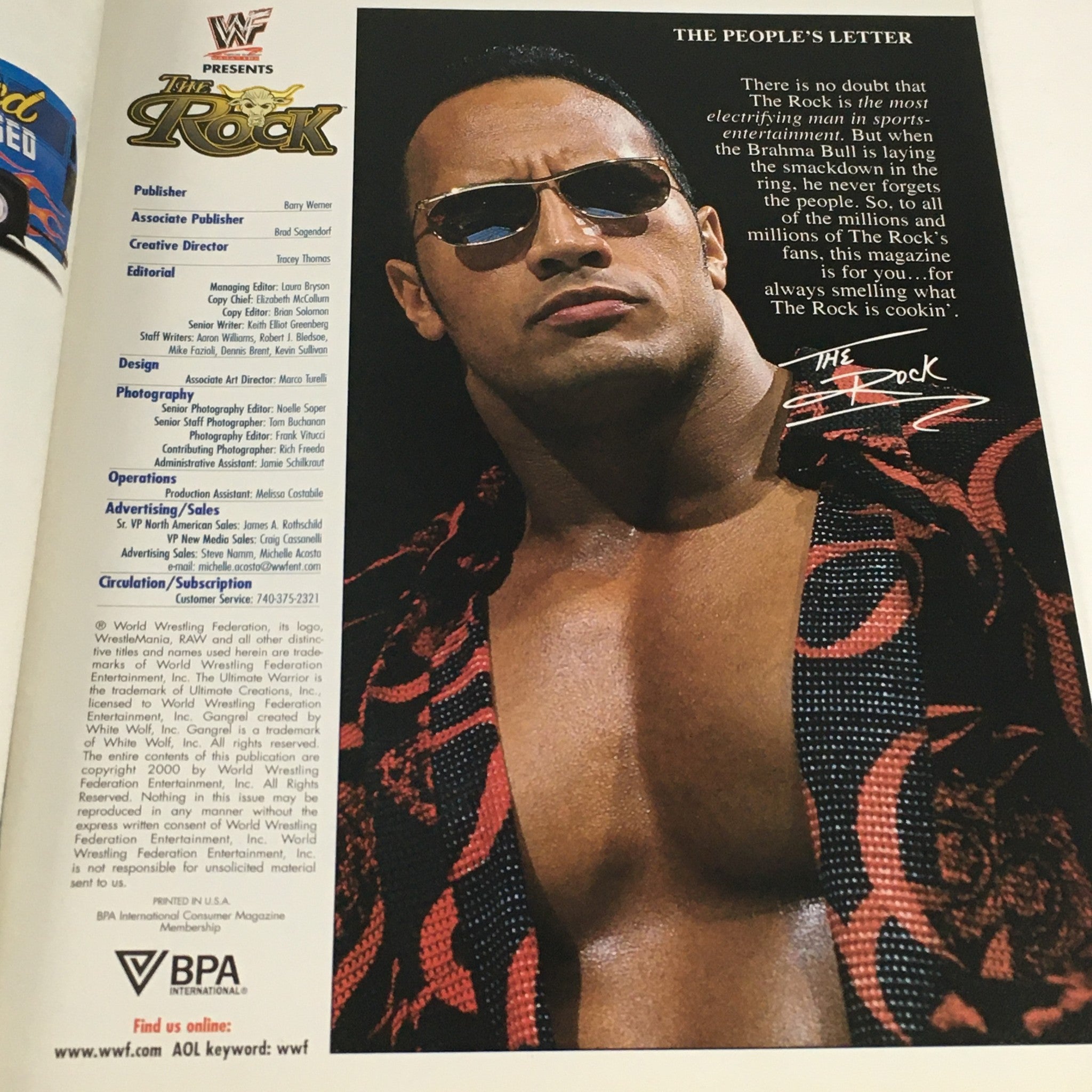 Inside page of WWF Magazine December 2000 highlighting Dwayne 'The Rock' Johnson with a statement about his electrifying persona.