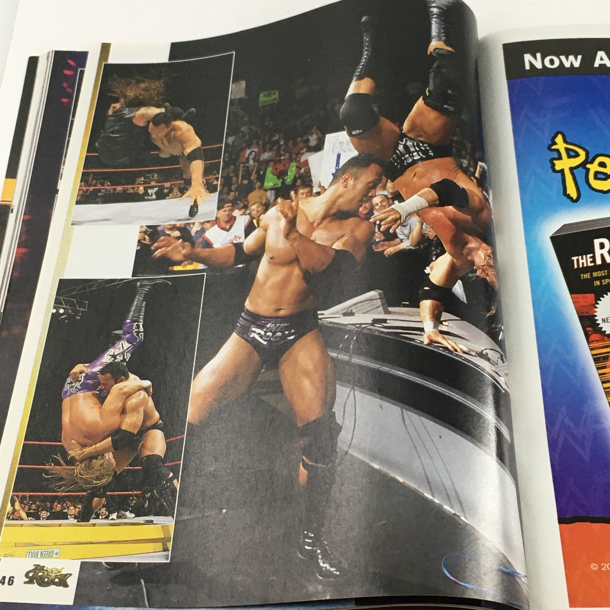 WWF Magazine December 2000 featuring Dwayne 'The Rock' Johnson in an action scene during a wrestling match, showcasing his athleticism.