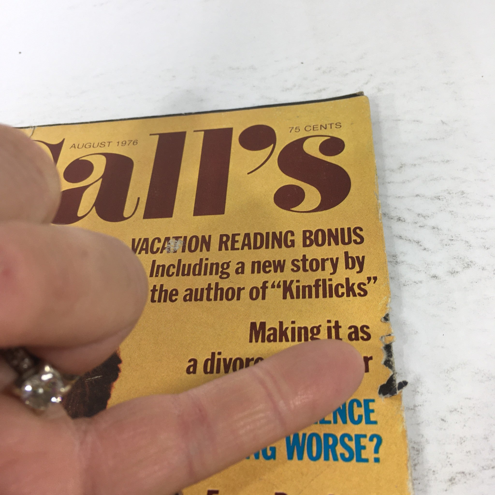 Close-up of VTG McCall's Magazine - August 1976 cover, emphasizing the Vacation Reading Bonus and content features, including Erma Bombeck's contributions.