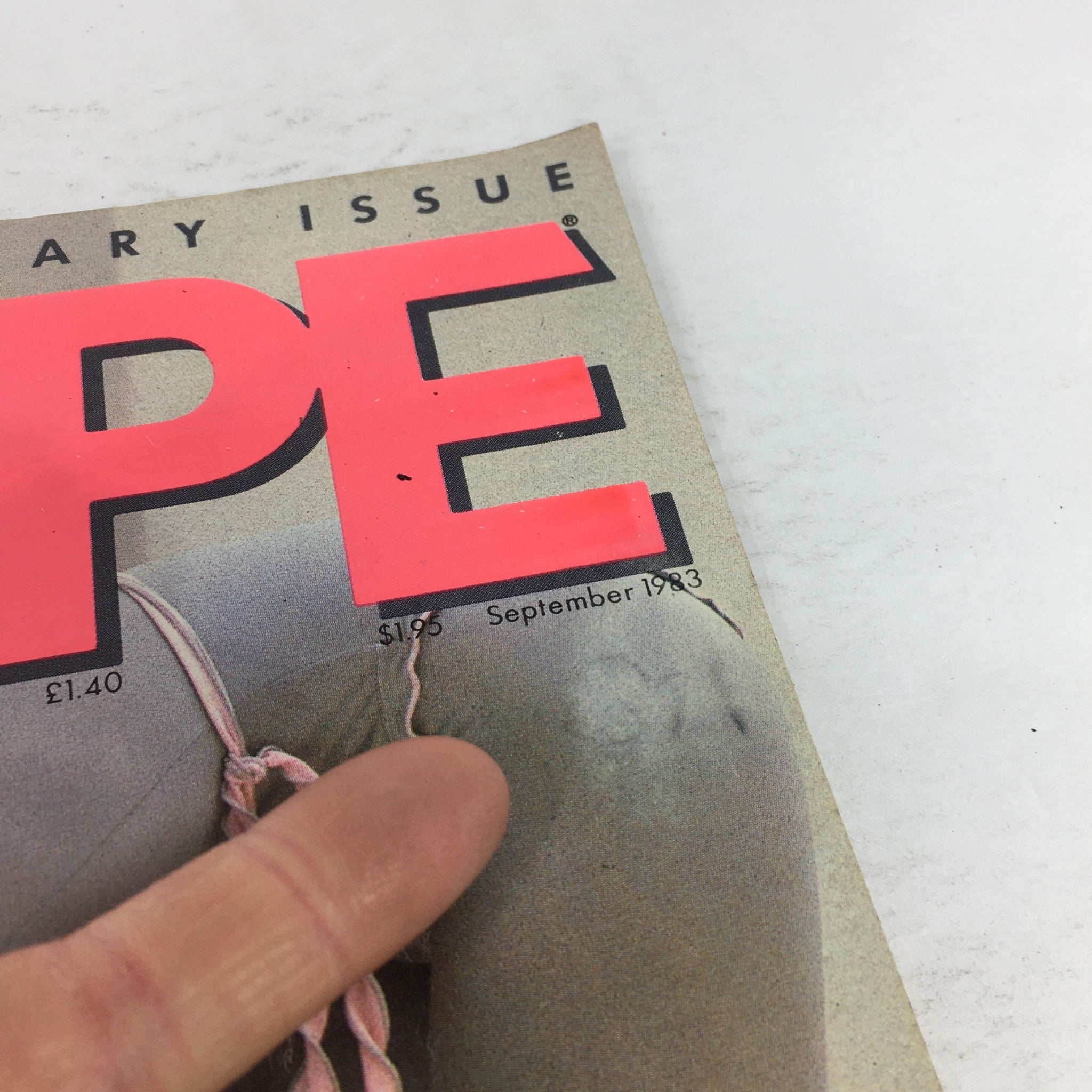 Close-up view of the title and issue date on VTG Joe Weider's Shape Dance Magazine: September 1983, highlighting the distinct vintage design and fitness theme.
