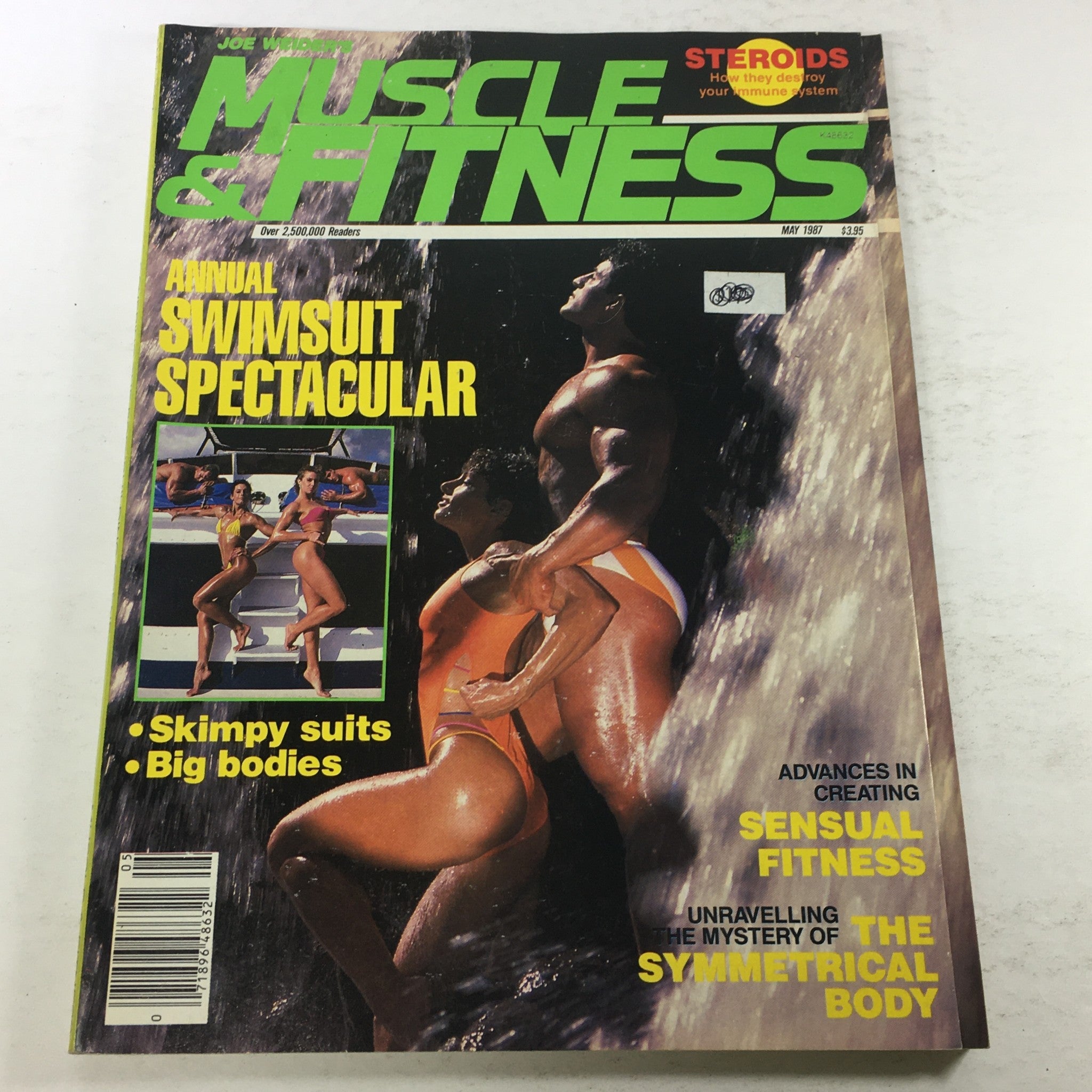 Cover of VTG Joe Weider's Muscle & Fitness: May 1987 - Swimsuit Spectacular, featuring a dynamic image of a couple posing in a waterfall, promoting fitness and swimsuits.