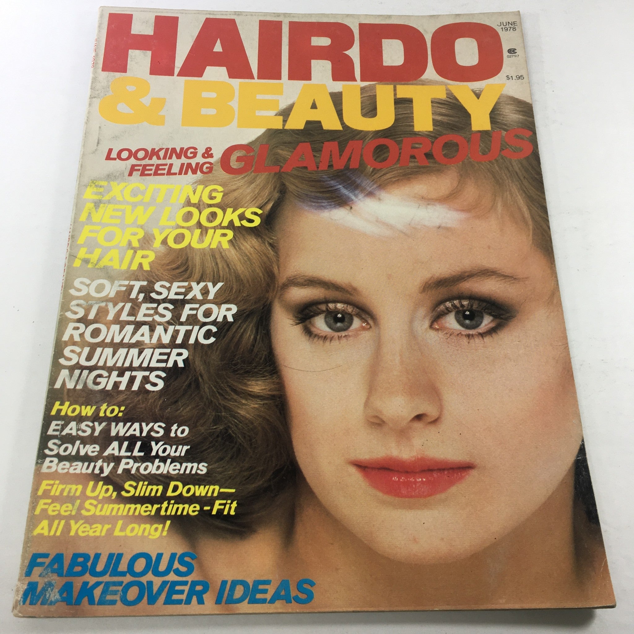 Cover of the VTG Hairdo & Beauty Magazine: June 1978 featuring vibrant colors, eye-catching headlines, and a glamorous model showcasing fashionable hairstyle and makeup trends of the late 1970s.