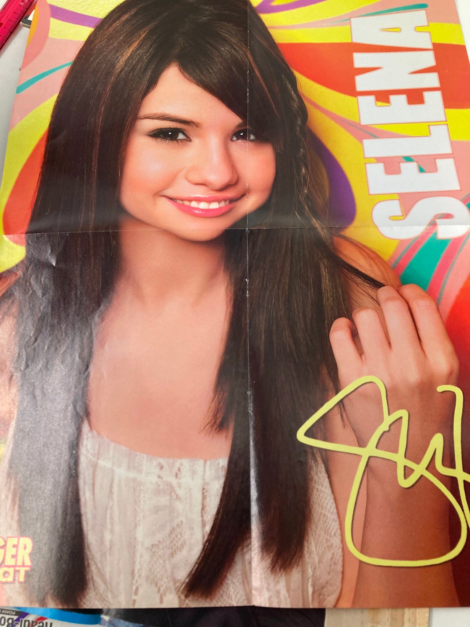 Tiger Beat Magazine September 2010 includes a vibrant poster of Selena Gomez, capturing her iconic look and charm that defines the era.