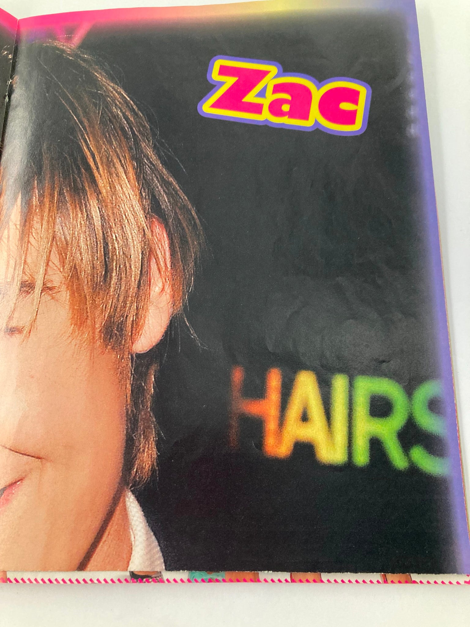 Close-up of Zac Efron feature from Tiger Beat Magazine October 2007, showcasing his hairstyle and charm.