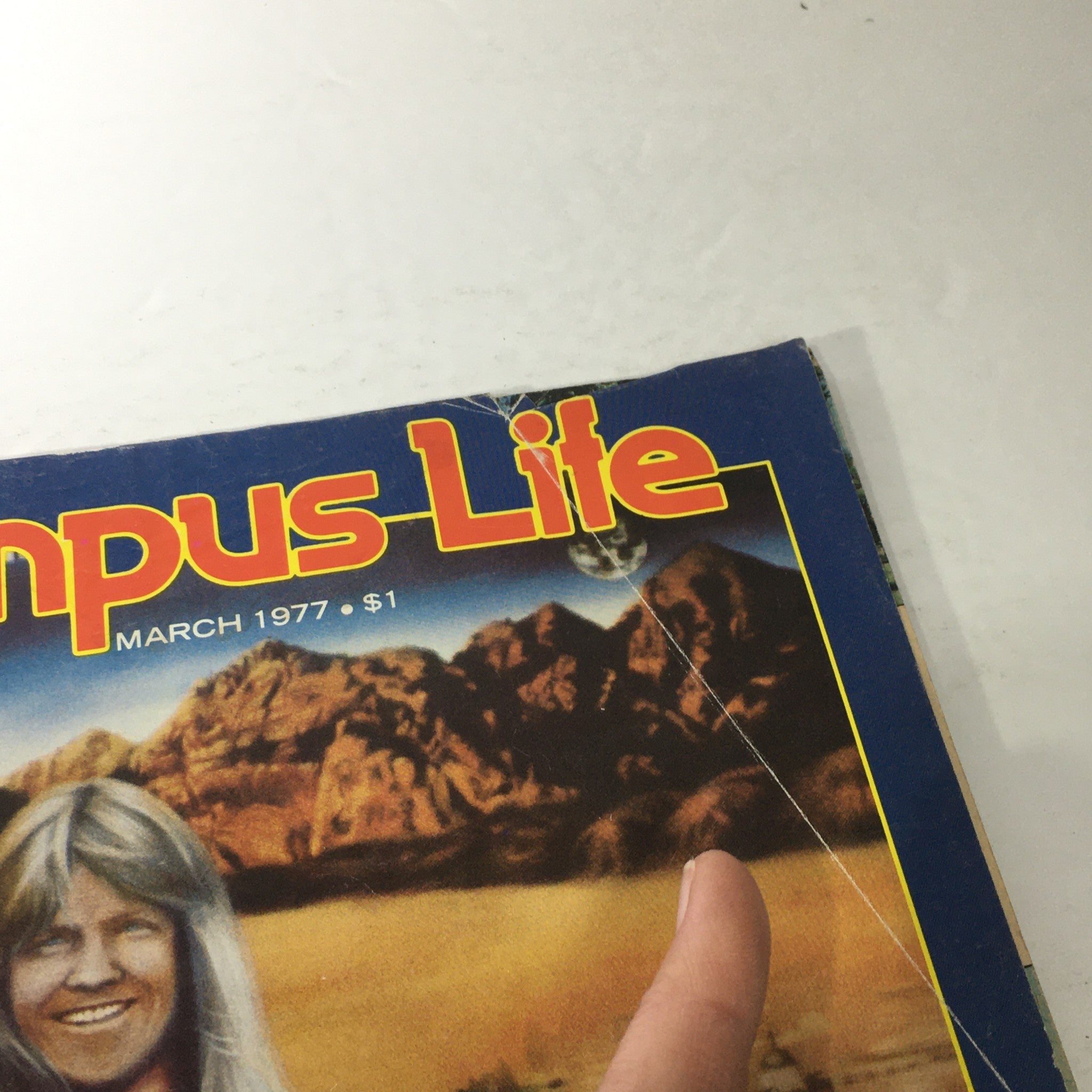 Cover of VTG Campus Life Magazine from March 1977 featuring Larry Norman, showcasing vintage design and imagery.